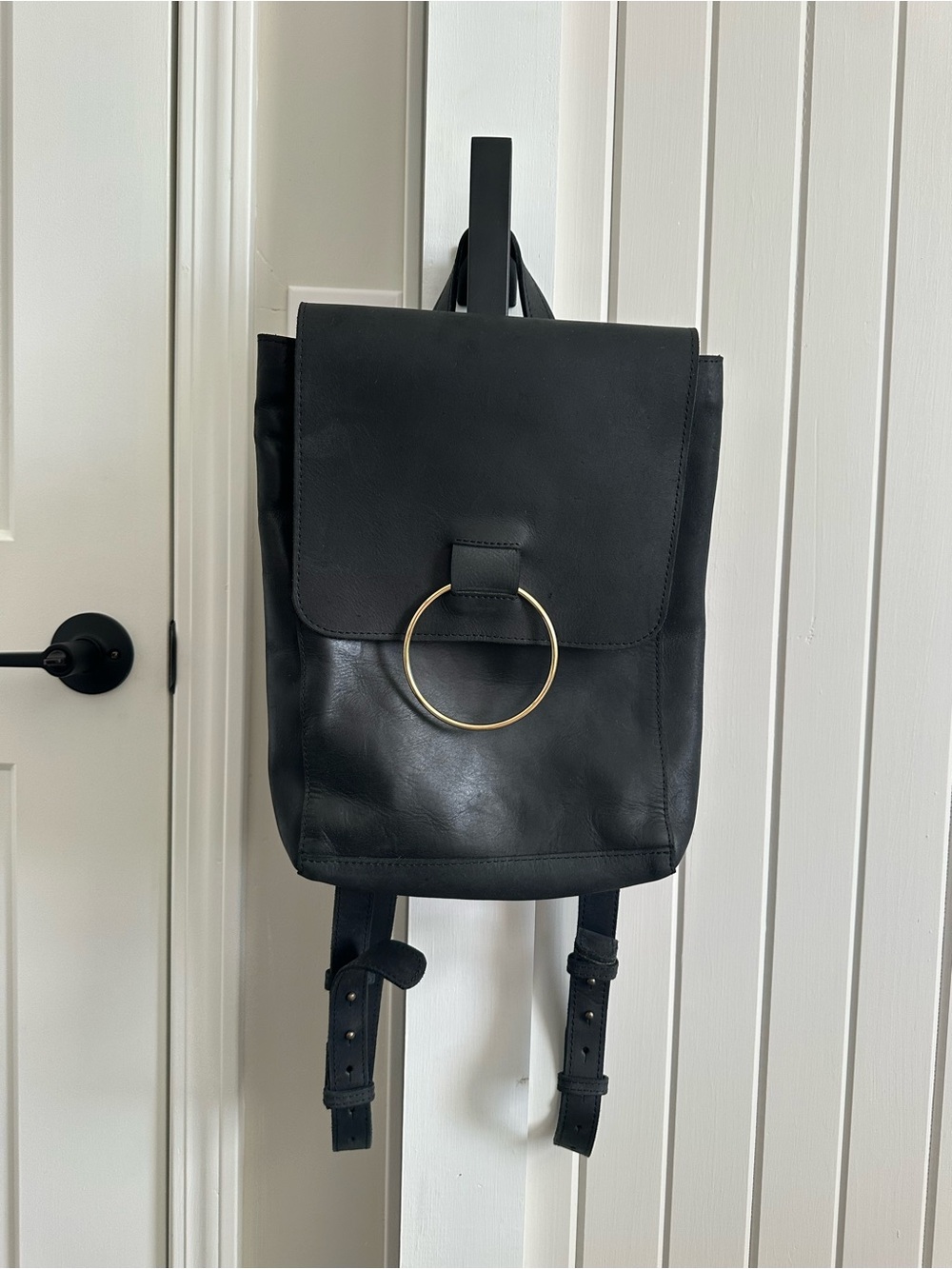 Able Black Leather Backpack with Gold Ring Accent